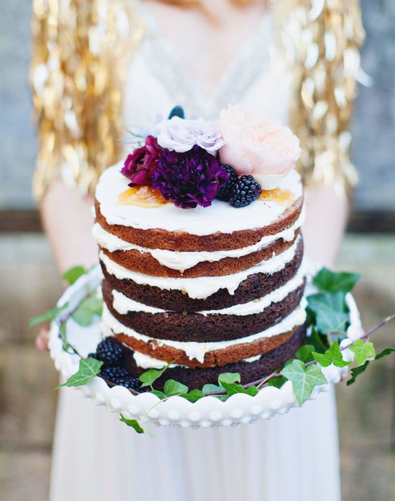 This naked cake with jewels tones has all the airiness of a romantic, lighthearted affair captured by Flora + Fauna + Liz Stewart Floral.