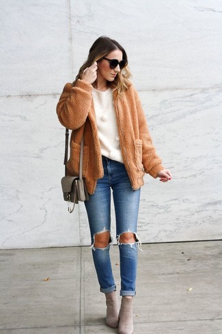 How to Wear Grey Suede Ankle Boots: Rock a tan fleece bomber jacket with blue ripped jeans for both chic and easy-to-achieve outfit. Infuse this outfit with a touch of refinement by wearing grey suede ankle boots.