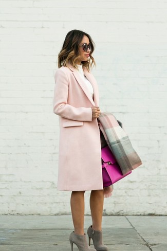 How to Wear Grey Suede Ankle Boots: This combo of a pink coat and a dark brown pencil skirt is ideal when you need to look nice but have no extra time. A pair of grey suede ankle boots serves as the glue that will bring your look together.
