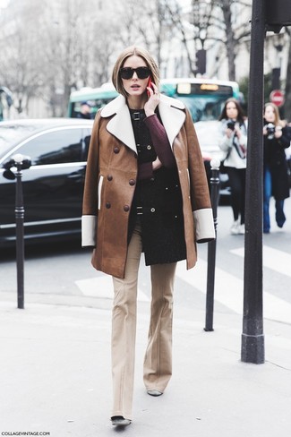 How to Wear Grey Suede Ankle Boots: If the situation calls for an elegant yet cool look, pair a brown shearling coat with beige flare pants. Complement this look with grey suede ankle boots and off you go looking stunning.