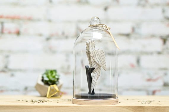 Origami bird under glass dome stand