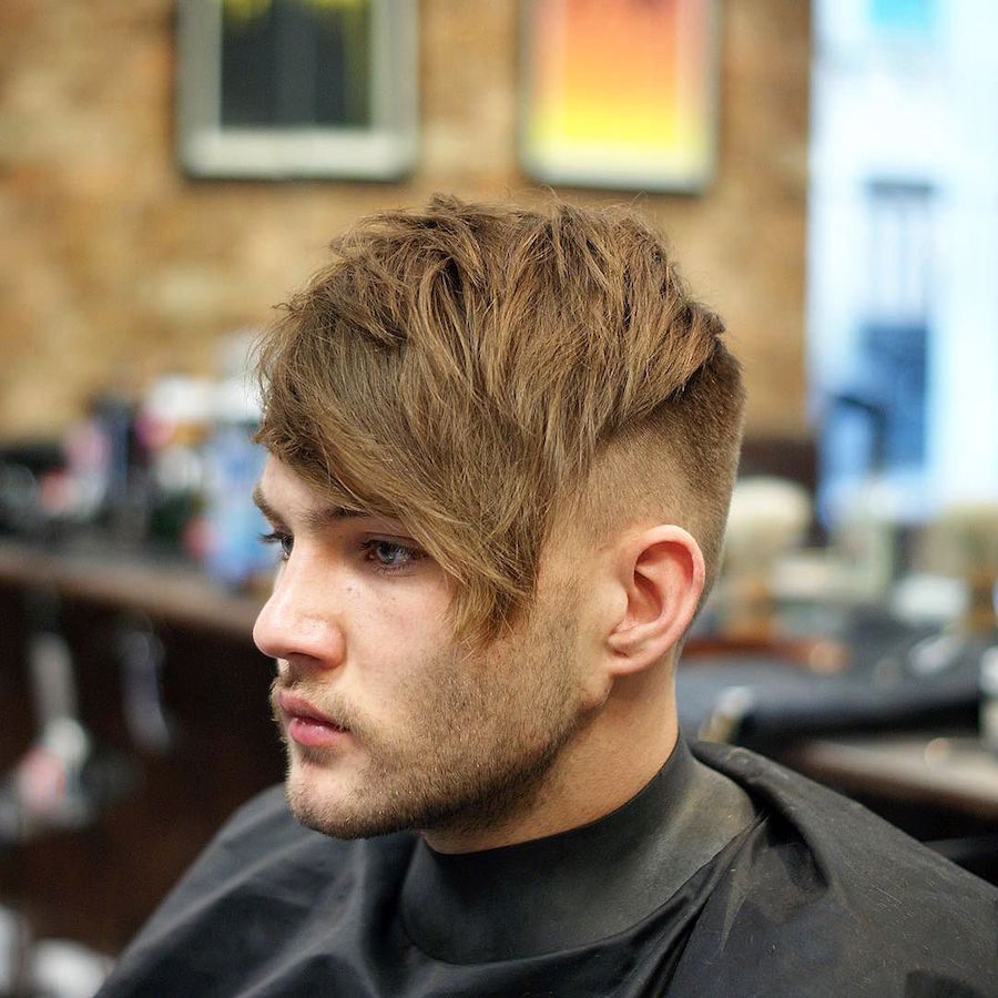 Textured hair and long fringe haircut for men