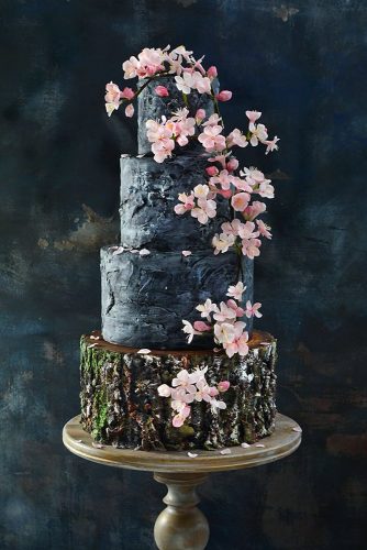 woodland themed wedding cakes dark bottom layer of a wooden decorated with a sprig of cherry blossoms nasa mala zavrzlama via instagram
