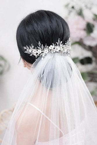 wedding hairstyles for long hair smooth low bun under the veil topgracia